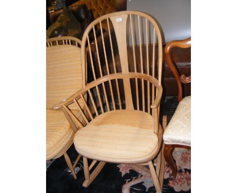 A vintage Ercol stick back rocking chair  CONDITION REPORT In our judgement, condition of chair frame is good. Notably howeve