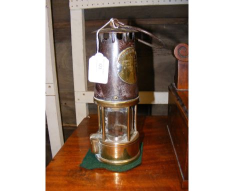 An old Protector Lamp and Lighting Company miners lamp