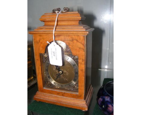 An Elliott walnut cased mantel clock - 20cms high