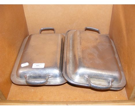 A pair of DCM Tudric hammered metal tureens 