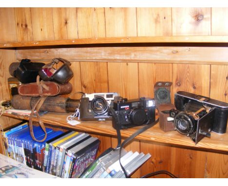 Assorted optical equipment, including a 1930's Nagal Vollenda camera with light meter, accessories and other vintage cameras 
