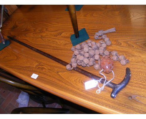 A sterling silver topped walking cane, olive wood rosary beads and an ornate trinket eggCONDITION REPORT.