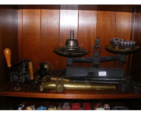 Vintage cast iron kitchen scales, together with mincers, beer barrel tap and other metalware 