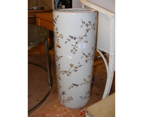 A large ceramic umbrella and stick stand, decorated with birds and foliage - bearing India Jane mark to base 
