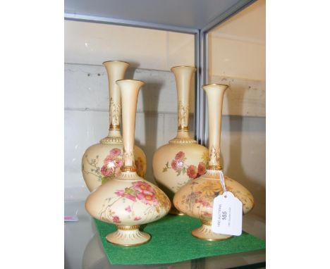 A pair of Royal Worcester vases with hand painted floral decoration - 23cms high, together with one other pair 18cms high