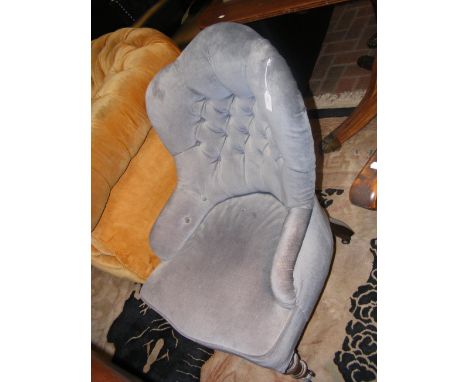 An antique Victorian button back nursing chair 