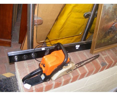 A Stihl chainsaw for renovation together with a sound bar