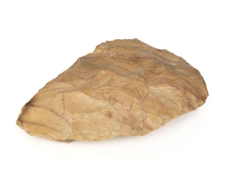 Prehistoric Axe. A prehistoric hand axe, from the Acheulian period, North Africa circa 1.2 million to 500,000 years old, 15cm