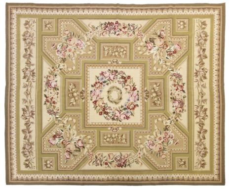 Carpet. An Aubusson-style carpet, early 20th century, hand-made tapestry wool carpet, in shades of pink, green, red, brown, a