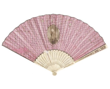 Fan. A George III folding fan, circa 1760, the recto with an oval printed portrait of King George III applied to pink paper p