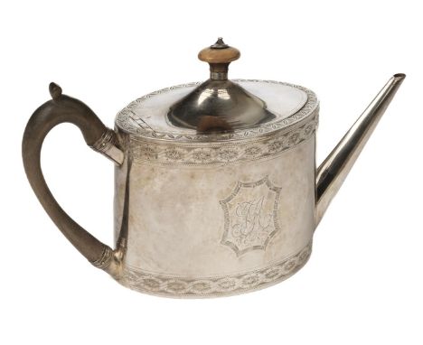 Teapot. A George III silver teapot by Henry Chawner, London 1783, of oval form with band decoration to the top and bottom and