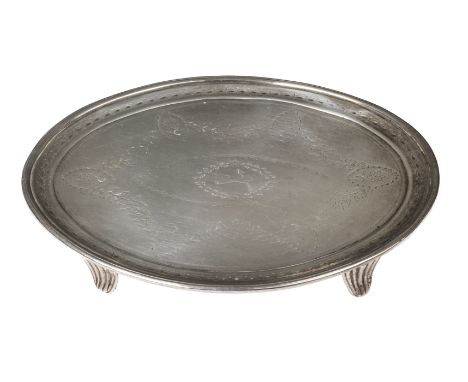 Teapot Stand. An 18th-century Irish silver teapot stand, Dublin hallmark but lacking date letter, of oval form engraved with 