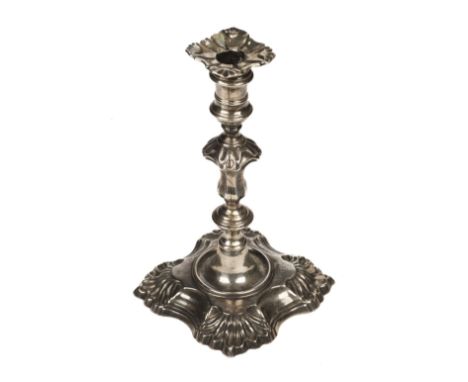 Candlestick. A George II silver candlestick by William Gould, London 1751, the ornate candlestick with detachable sconce and 