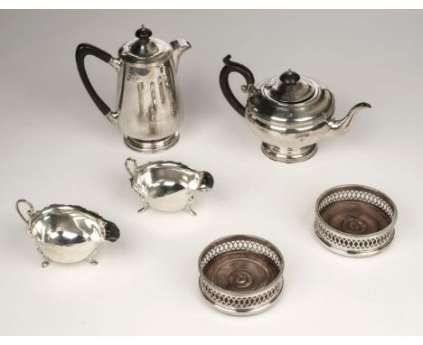 Mixed Silver. A George V silver coffee pot by Walker &amp; Hall, Sheffield 1929, of tapered form with ebony finial and handle