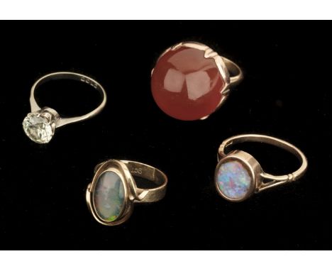 Dress Rings. A 15ct gold opal ring, the flat oval opal in poor condition, size Q/R, together with a 9ct gold and opal ring, t