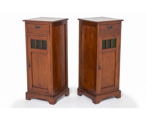 A PAIR OF TALL GLASS PANELLED SIDE CABINETS
Fitted with three green glass panels to the front, a single drawer and cupboard, 