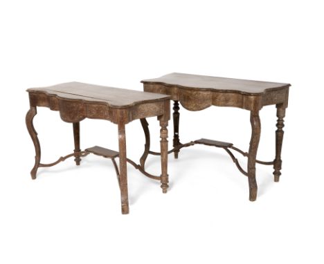 TWO SIMILAR PERANAKAN CARVED CONSOLE TABLES
Serpentine front with carved fronts depicting floral motifs, the cabriole support