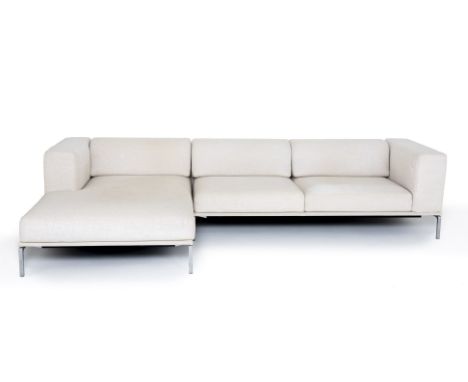 A CASSINA 'MOOV' SOFA
Cream fabric with an aluminium frame with movable headrest, can be sectioned off into parts for transpo