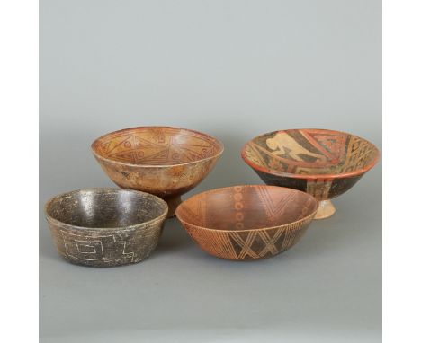 Four Pre-Columbian ceramic bowls originating from regions in South America, including two Narino bowls from Colombia (1200-14
