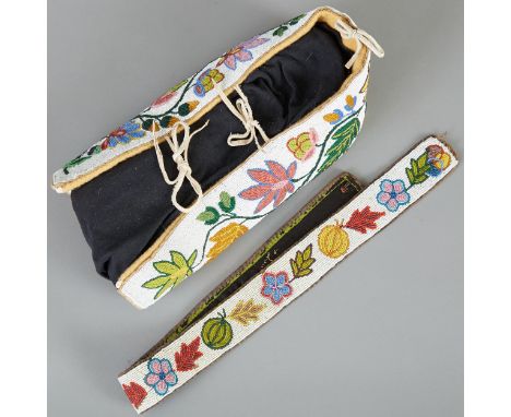 Native American doll cradle and matching sash. Colorful beading with a  floral motif and white background.Dimensions: Doll cr