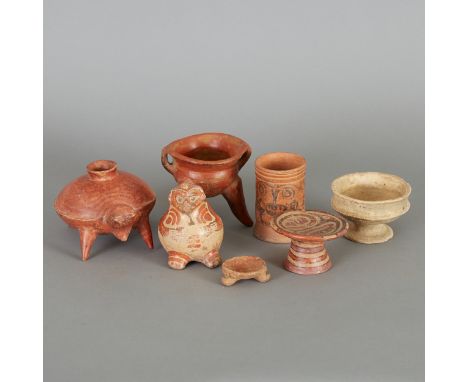 Seven small Pre-Columbian ceramic items, including: one Toltec beaker (600-1200 C.E.); one Nicoya effigy vessel (800-1200 C.E