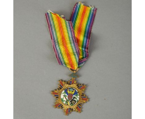 An excellent Chinese medal of the KMT; this award is known as the "red's loyalty to the KMT medal".  This medal honors the no
