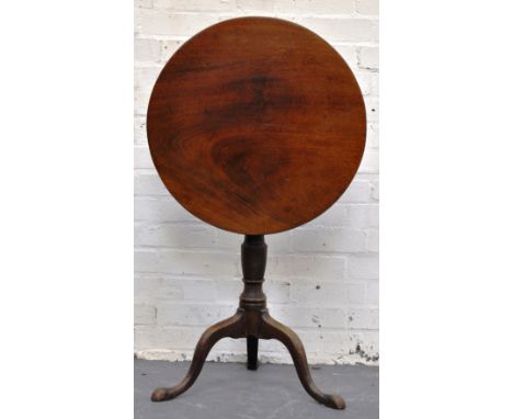 Georgian mahogany pedestal table, circular tilt top, baluster column on tripod legs, diameter 58cm.