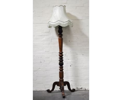 Mahogany standard lamp, adapted from a Victorian bed post, tripod base with shade, 205cm overall.
