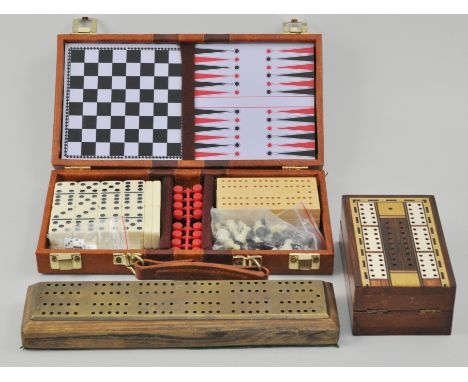 Parquetry work cribbage board, 13cm, a brass faced cribbage board and a games compendium.