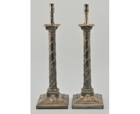 Pair of plated Corinthian column candlesticks, serving as lamp bases with bell flower decoration, gadrooned outlines, 41cm ov