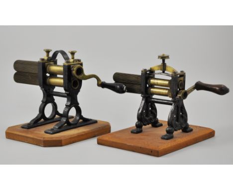 Vintage brass and cast iron crimping machine, height 21cm and another, (2).