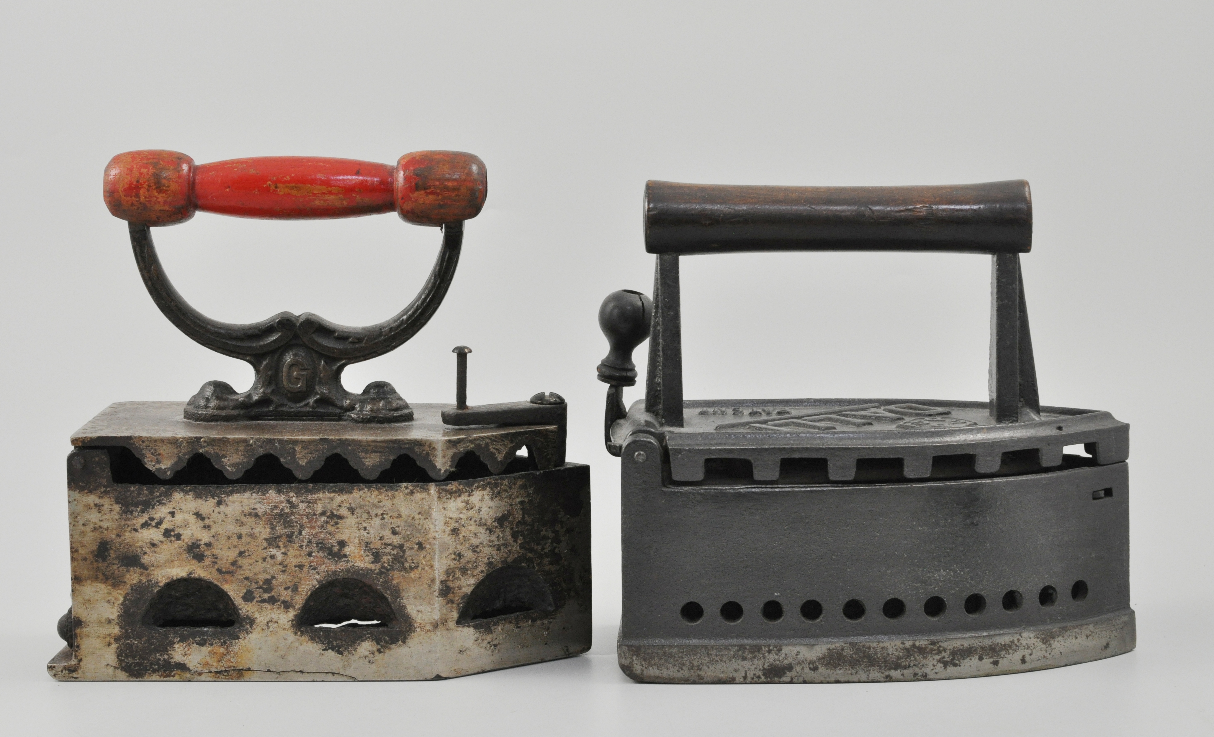 The DALLI patent charcoal iron, and four other vintage charcoal irons, (5).