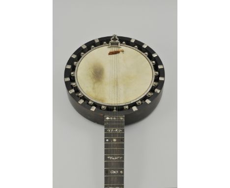 Vintage banjo, in a leather case.