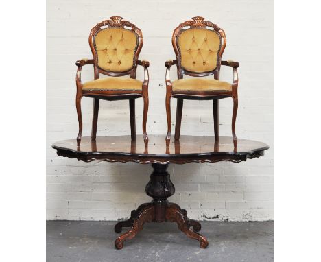 An Italian reproduction dining room suite, comprising a "marquetry" single pedestal table, serpentine outlines, bulbous colum