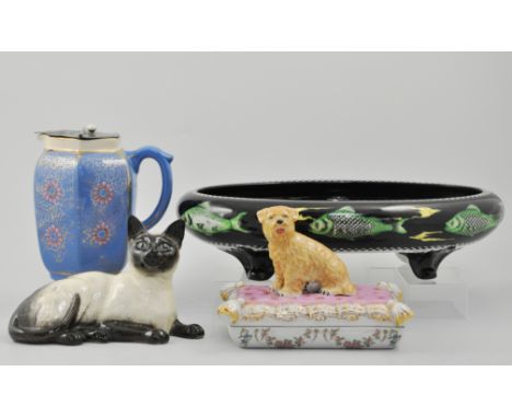 Solian Ware shallow bowl, decorated with fish to a black ground, on four scrolled feet, a Beswick model of a Siamese cat no 1