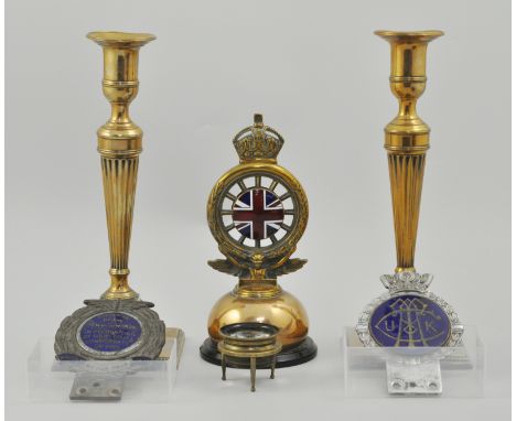 Two vintage enamel car badges, RAC Radiator badge by Ellkington & Co., a lense and pair of candlesticks.