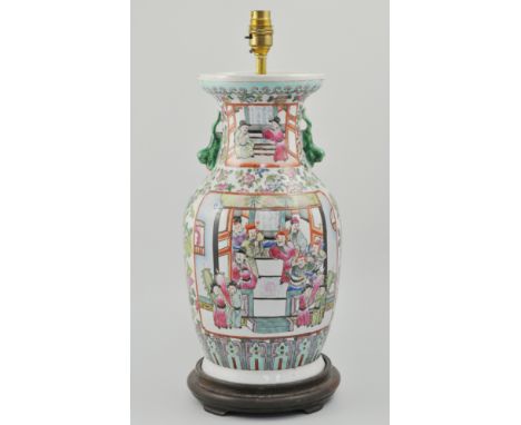 Cantonese polychrome vase, serving as a lamp base, reserves decorated with Mandarin figures, 51cm overall.