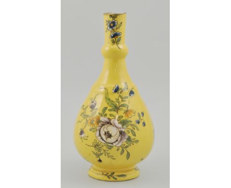 French Faience bottle vase, mid 18th Century, floral decoration on a yellow ground, old damage, serving as a lamp base, heigh