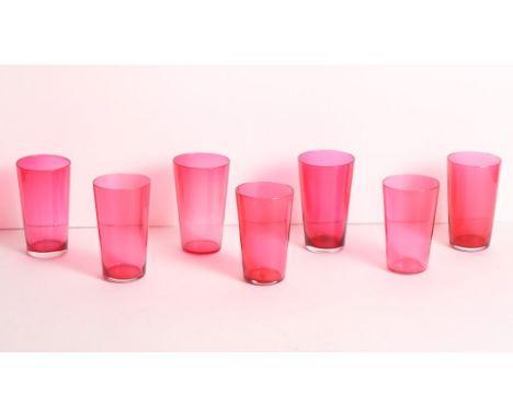 A set of seven plain ruby glass tumblers