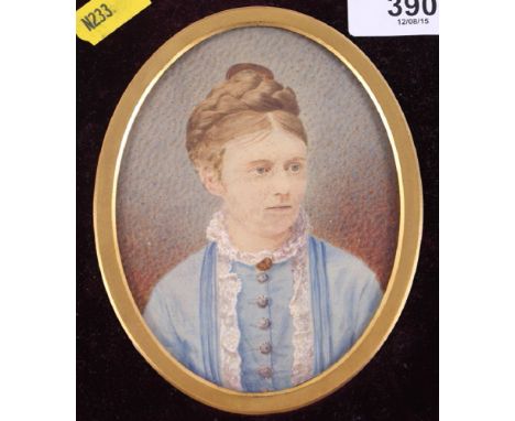 A Victorian oval miniature portrait of an unknown lady, 4 1/2" x 3 3/4", in oval gilt metal mount and red travelling case, an
