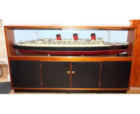 A scratch built working scale model of "RMS Queen Mary" constructed by M J Glandfield 1953, scale 1/16" to 12" (1:192), 64" l