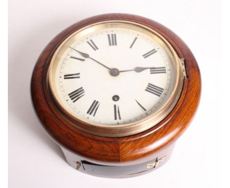 A 19th Century wall clock in polished wooden case with 8" circular painted dial
