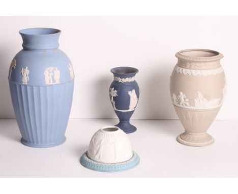 A Wedgwood blue jasperware vase with half fluted sides, two other smaller vases and a night light holder