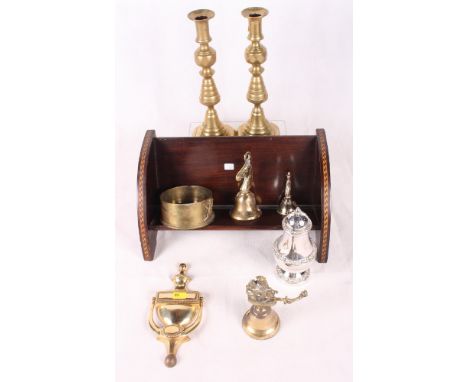 A pair of Victorian brass candlesticks, a brass door knocker, a trench art bottle stand, a mahogany and inlaid book stand, a 