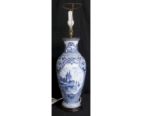 Large Delft blue and white porcelain baluster vase converted to a table lamp, transfer printed with a continental town by a r