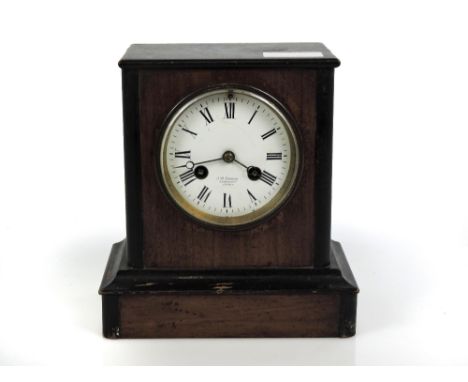 Walnut and ebonised small two train mantel clock, the brass movement marked JWB with outside countwheel and striking on a bel