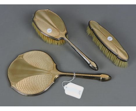 Art Deco buff enamel and silver three piece brush set, Birmingham 1930