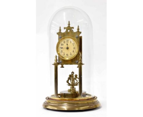 German brass torsion mantel clock, upon two cylindrical supports under glass dome, numbered 5567 to back plate, 13" high over