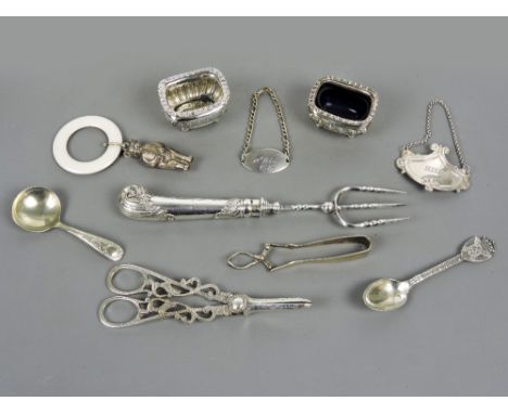 Antique silver plated/white metal assorted items including pistol handled bread knife, ornate grape scissors, teddy bear teet