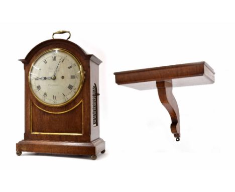 Mahogany double fusee arch top bracket clock and bracket, signed Jones Bros, 12 Gloucester Street, Clerkenwell to the painted